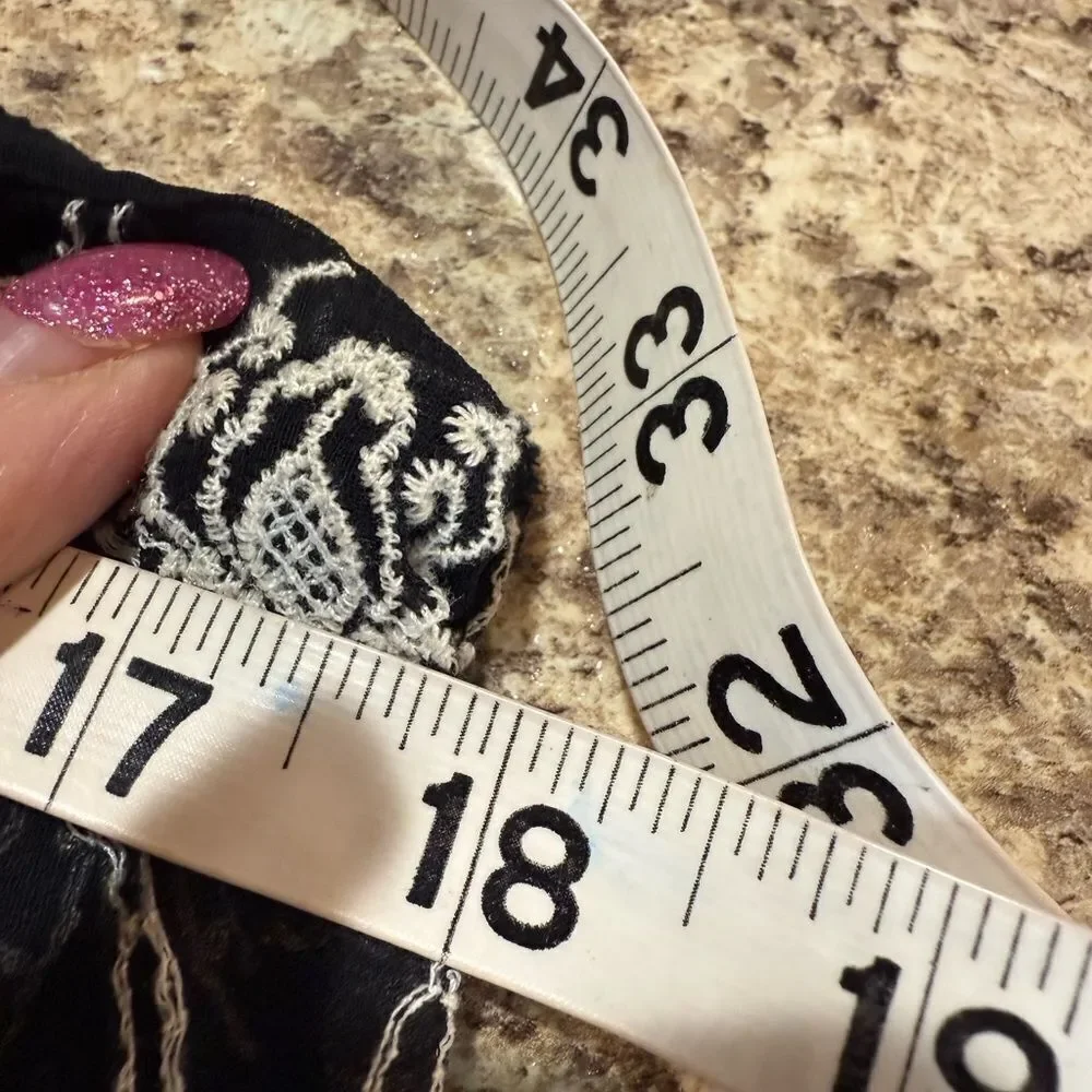 Anthropology size XS black spaghetti strap for ruffle hem dress
